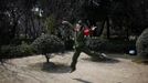 Cao, a 57-year-old gay man, performs as a cultural revolution red guard at a park in Shanghai March 13, 2012. China's gay community has long been on the edges of society but it is gradually becoming more accepted. Cao, who is an unemployed drag queen, is one whose life lifts the curtain on a less romanticised view of Chinese homosexuals. Living in an eight-square-metre apartment behind a public toilet and with a monthly income of 500 yuan ($79) from social insurance, he passes his days dancing in public and spending time with friends at gay clubs. Picture taken March 13, 2012. REUTERS/Aly Song (CHINA - Tags: SOCIETY TPX IMAGES OF THE DAY) ATTENTION EDITORS PICTURE 14 OF 28 OF PACKAGE 'GAY AND OUT IN CHINA' TO FIND ALL IMAGES SEARCH 'GAY OUT CHINA' Published: Čer. 1, 2012, 12:38 dop.