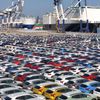 FILE PHOTO: Cars to be exported sit at a terminal in the port of Yantai