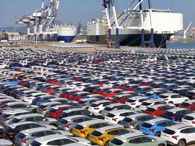 FILE PHOTO: Cars to be exported sit at a terminal in the port of Yantai, Shandong province, China January 10, 2024. China Daily via REUTERS  ATTENTION EDITORS - THIS IMAG