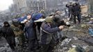 ATTENTION EDITORS - VISUAL COVERAGE OF SCENES OF INJURY OR DEATH - Anti-government protesters carry an injured man on a stretcher in Independence Square in Kiev February