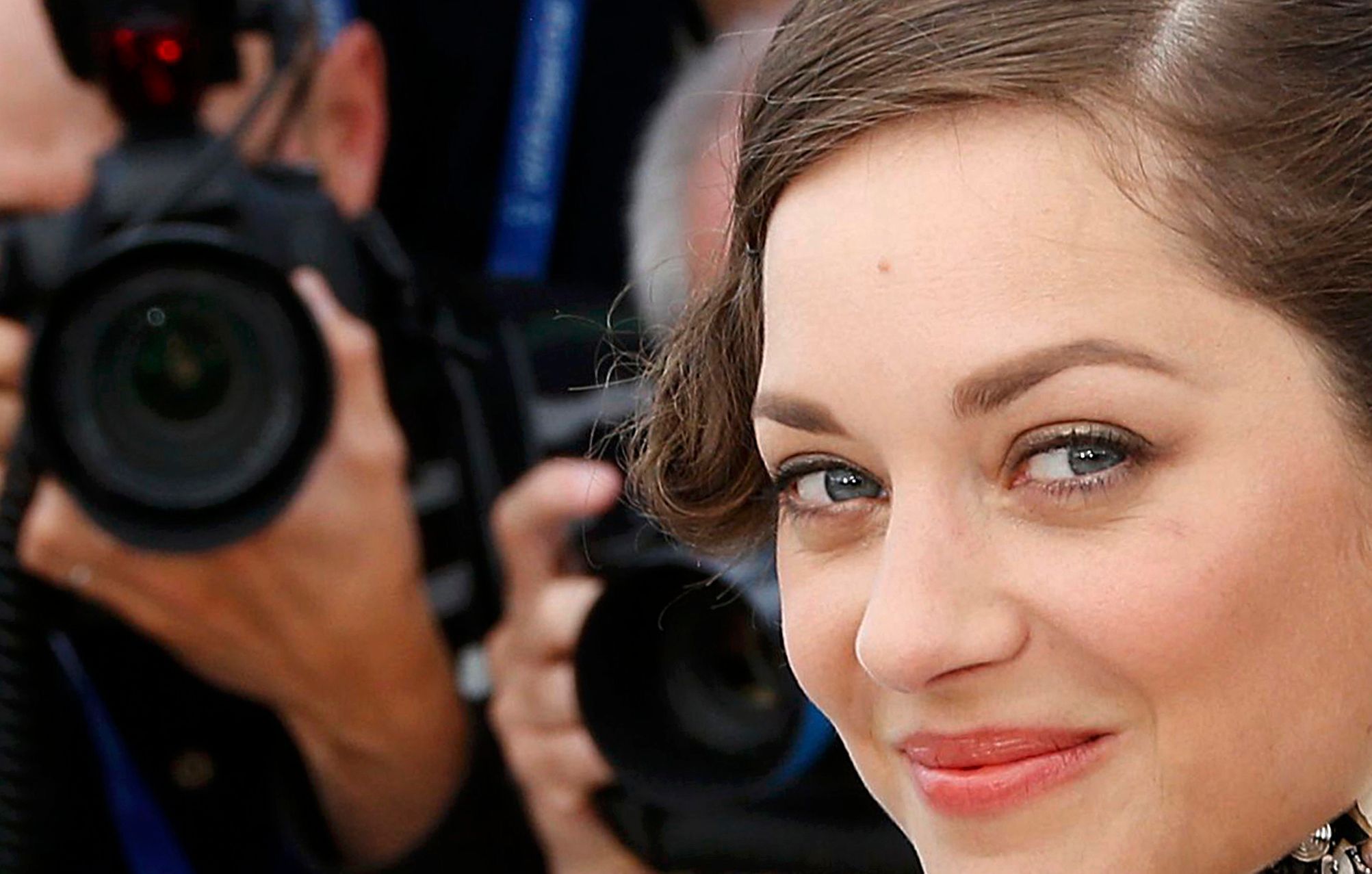 Cast member Marion Cotillard poses during a photocall for the film &quot;Deux jours, une nuit&quot; in competition at the 67th Cannes Film Festival in Cannes