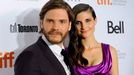 Daniel Bruhl poses on the red carpet with girlfriend Felicitas Rombold