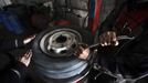 Gaza child labour 2012-02-23 00:00:00 epa03119004 Palestinian children work repairing a car tyre in the town of Beit Lahyia in northern Gaza on 23 February 2012. Reports state that child labor is widespread in the Gaza Strip because of the high rate of poverty and unemployment. Palestinain children leave school and go to work in an attempt to improve their standard of living, for low salaries because of lack of employment opportunities in Gaza. EPA/ALI ALI