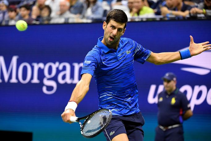 Sep 1, 2019; Flushing, NY, USA; Novak Djokovic of Serbia hits to Stan Wawrinka of Switzerland in the fourth round on day seven of the 2019 US Open tennis tournament at US