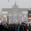 People attend New Year celebrations at the Brandenburger Tor gate in Berlin