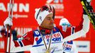 Norway's Northug celebrates winning the men's cross country 50 km mass start classic race at the Nordic World Ski Championships in Falun