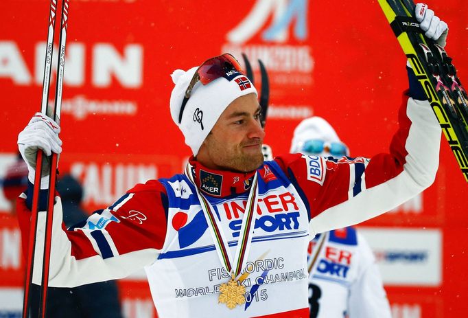 Norway's Northug celebrates winning the men's cross country 50 km mass start classic race at the Nordic World Ski Championships in Falun