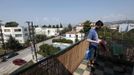 Thanos Kehagias hangs out laundry at his student flat in the Greek city of Patra