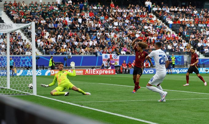 Soccer Football - Euro 2024 - Group E - Belgium v Slovakia - Frankfurt Arena, Frankfurt, Germany - June 17, 2024 Slovakia's Ivan Schranz scores their first goal past Belg