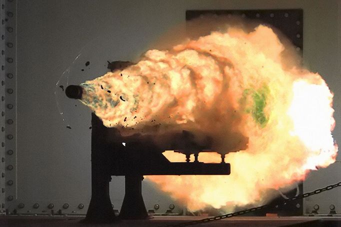 Projectile Fired From Electromagnetic Rail Gun A high-speed video camera image of the firing of an electronic railgun (EMRG) at the Naval Surface Warfare Center in Dahlgren, Virginia. This firing, at 10.64 megajoules with a muzzle velocity of 2520 meters per second, set a record.