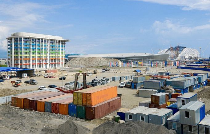 Olympic Park under construction in Sochi, Russia SOCHI, RUSSIA. MAY 20, 2013. The construction site of a hotel for journalists, Adler Arena Stadium, and Bolshoi Stadium (L-R in the distance) in Olympic Park. In 2014 Sochi is set to host 2014 Winter Olympic Games.