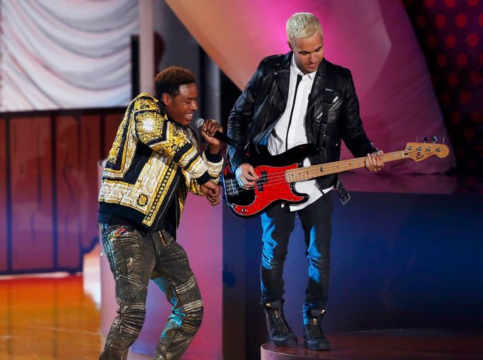 Pete Wentz performs with Fetty Wap during the 2015 MTV Movie Awards in Los Angeles