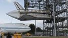 The space shuttle Discovery is approached by a NASA 747 aircraft which was towed into the Mate Demate facility, at Kennedy Space Center in Cape Canaveral