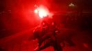 Soccer Football - FIFA World Cup Qatar 2022 - Fans in Nice watch France v Morocco - Nice, France - December 14, 2022 France fans with a flare as they celebrate reaching t