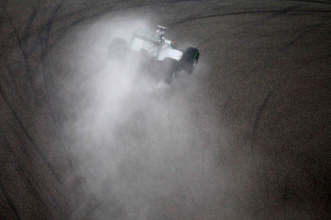 Mercedes Formula One driver Lewis Hamilton drives during the qualifying session of the Chinese F1 Grand Prix at the Shanghai International circuit, April 19, 2014. Hamilt