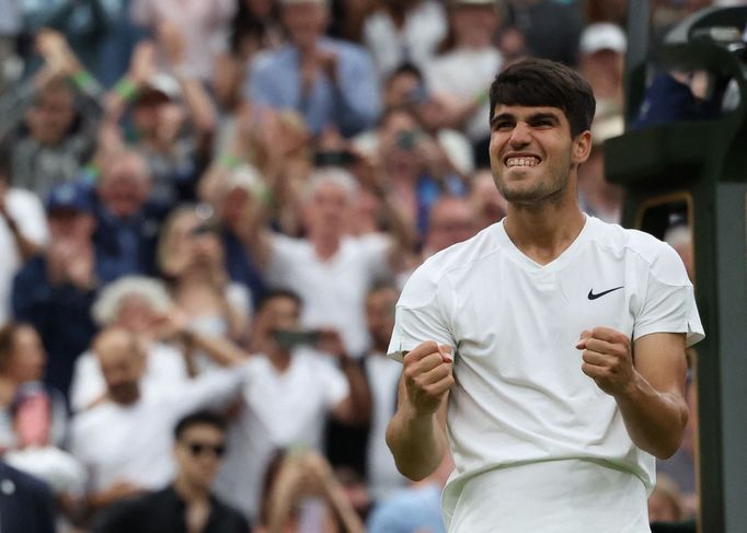 Tennis - Wimbledon - All England Lawn Tennis and Croquet Club, London, Britain - July 5, 2024 Spain's Carlos Alcaraz celebrates after winning his third round match agains