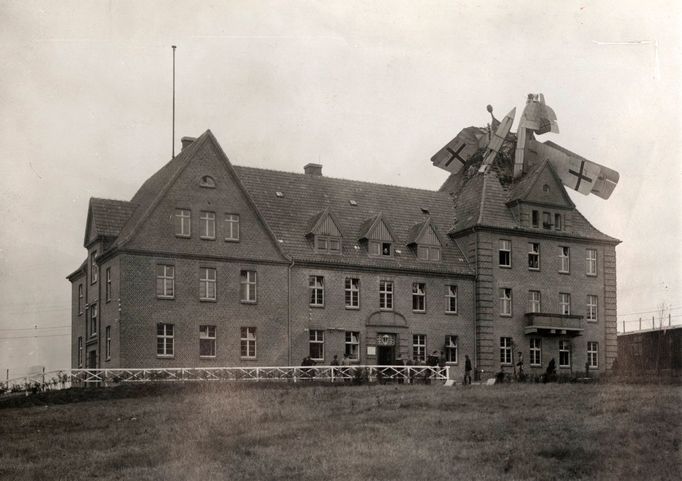 A German Friedrichshafen seaplane is seen crashed into a building in Germany, 1918 in this handout picture.