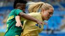 Mamello Makhabane (RSA) of South Africa (L) and Elin Rubensson (SWE) of Sweden in action.