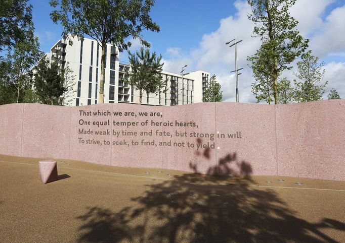 Words from a Ulysses poem by Alfred Tennyson are seen inscribed in the wall next to the Olympic Village Service Centre built for the London 2012 Olympic Games in Stratford, east London on June 29, 2012. The village will accomodate up to 16,000 athletes and officials from more than 200 nations. REUTERS/Olivia Harris (BRITAIN - Tags: SPORT OLYMPICS BUSINESS CONSTRUCTION CITYSPACE) Published: Čer. 30, 2012, 12:18 odp.