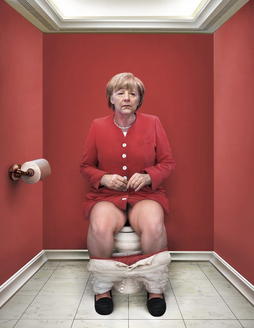 Na WC Merkelová