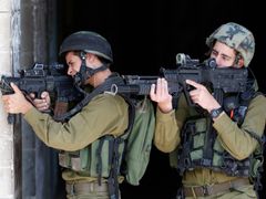 Izraelští vojáci v Hebronu.