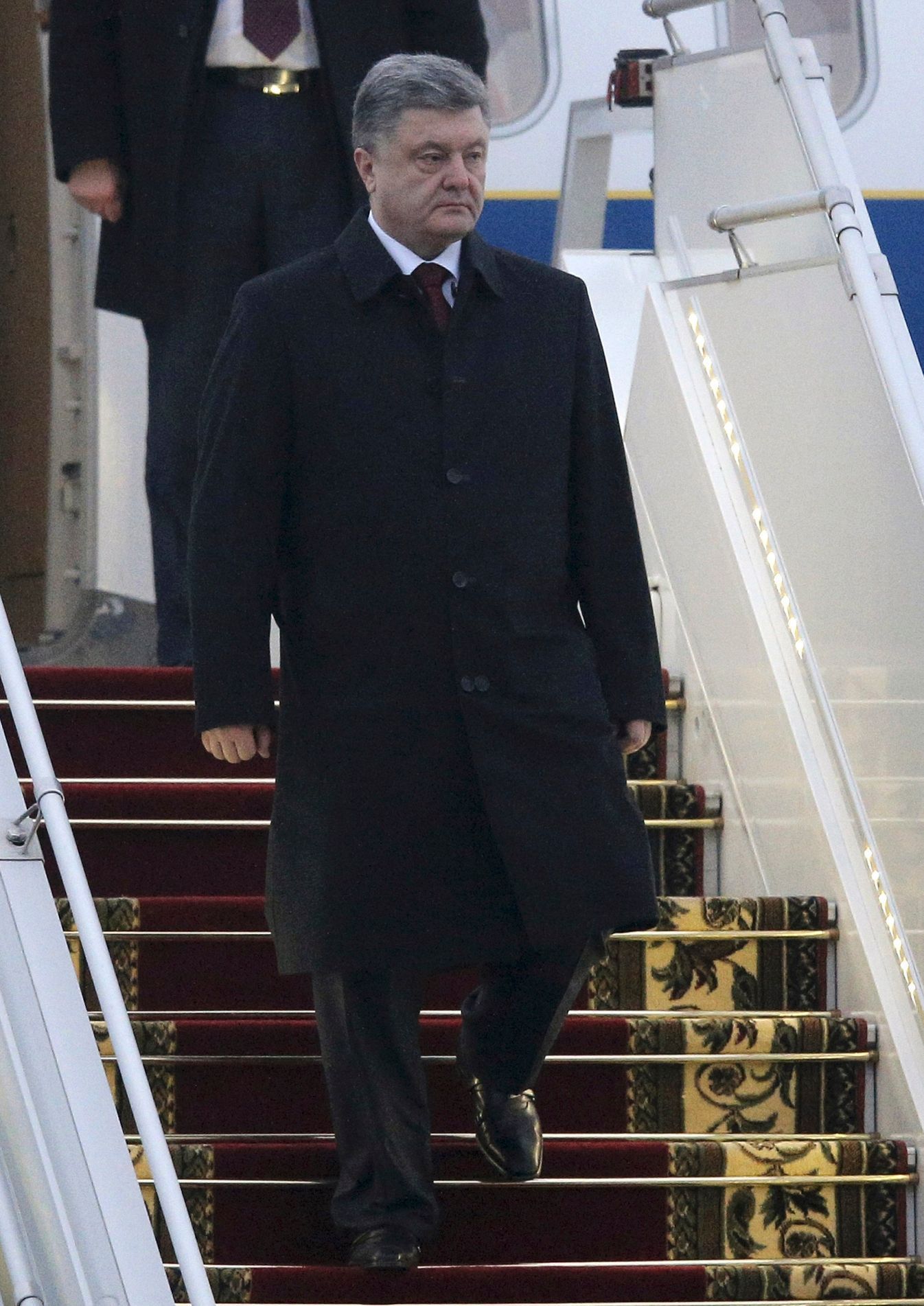 Petro Porošenko po příletu do Minsku.