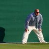 A  line judge stands on court three at the Wimbledon Tennis