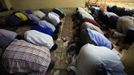 Muslims pray during Friday prayers outside Juba mosque in Juba