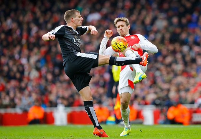 Leicester's Marc Albrighton in action with Arsenal's Nacho Monreal