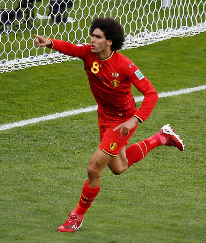 Belgium's Marouane Fellaini celebrates scoring a goal against Algeria during their 2014 World Cup Group H soccer match at the Mineirao stadium in Belo Horizonte June 17,