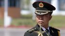 A military band conductor waits to perform before a departure ceremony for Chinese astronauts at the Jiuquan Satellite Launch Center, Gansu province June 16, 2012. China launched a spacecraft putting its first woman in orbit on Saturday as the country takes its latest step towards building a space station within the decade. A Long March rocket blasted off from the remote Jiuquan Satellite Launch Centre in China's northwestern Gobi Desert, carrying with it the Shenzhou 9 spacecraft and three astronauts, Jing Haipeng, Liu Wang and 33-year-old female fighter pilot Liu Yang. REUTERS/Jason Lee (CHINA - Tags: MILITARY SCIENCE TECHNOLOGY) Published: Čer. 16, 2012, 12:45 odp.