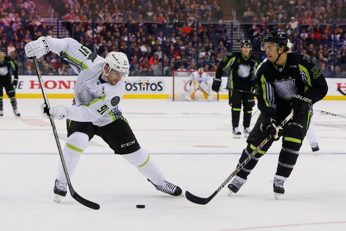 Jan 25, 2015; Columbus, OH, USA; Team Toews center John Tavares (91) of the New York Islanders and Team Foligno defenseman Kevin Shattenkirk (22) of the St. Louis Blues f