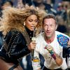 Beyonce and Chris Martin of Coldplay perform during the half-time show at the NFL's Super Bowl 50 between the Carolina Panthers and the Denver Broncos in Santa Clara