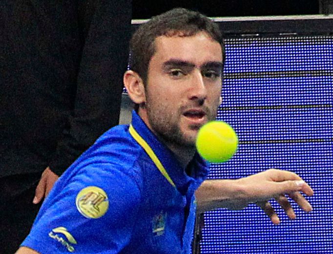 Marin Cilic of the UAE Royals eyes the ball during his men's singles match against Tomas Berdych of the Singapore Slammers during the International Premier Tennis League