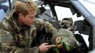 Britain's Prince Harry speaks during an interview with media at Camp Bastion, southern Afghanistan in this photograph taken December 12, 2012, and released January 21, 2013. The Prince, who is serving as a pilot/gunner with 662 Squadron Army Air Corps, is on a posting to Afghanistan that runs from September 2012 to January 2013. Photograph taken December 12, 2012. REUTERS/John Stillwell/Pool (AFGHANISTAN - Tags: MILITARY POLITICS SOCIETY MEDIA ROYALS CONFLICT) Published: Led. 21, 2013, 9:11 odp.