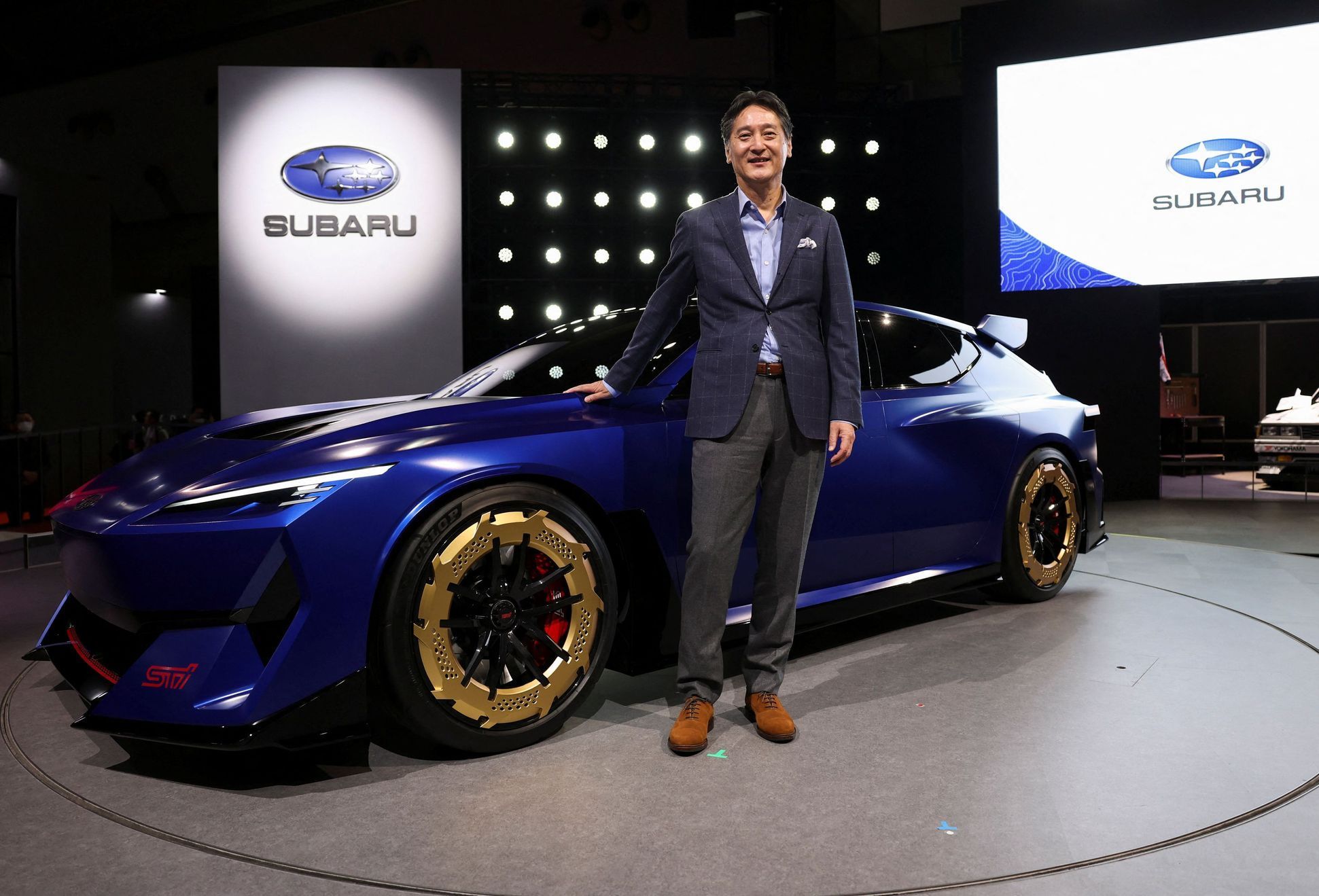 Subaru President and CEO Atsushi Osaki speaks during a press briefing at the Japan Mobility Show 2025 in Tokyo