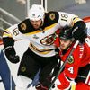 Bruins' Horton tries to get around Blackhawks' Hjalmarsson d