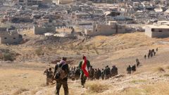Kurdové bojují o město Sindžár proti IS.