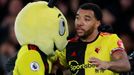 Soccer Football - Premier League - Watford v Liverpool - Vicarage Road, Watford, Britain - February 29, 2020  Watford's Troy Deeney celebrates with mascot Harry the Horne