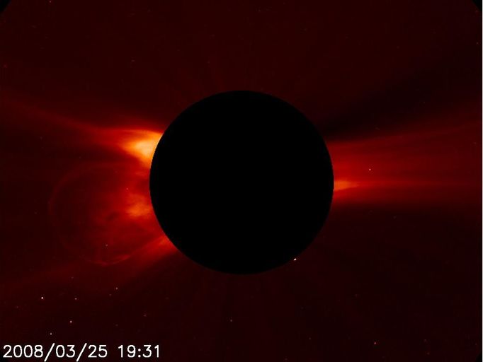 CME on March 25, 2008 as Seen by SOHO By analyzing the size and shape of the bow shock on this March 25, 2008 coronal mass ejection (the loop extending to the left) scientists have devised a technique to measure magnetic fields near the sun. Credit: NASA/SOHO