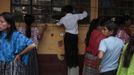 A child looks at a crime scene in a classroom of a primary school after two children, a 8-year-old and a 13-year-old, were killed by a man with a machete in Tactic, in Alta Verapaz region, some 189km (117 miles) from Guatemala City, September 12, 2012. The man was then lynched and burnt alive by a mob at the school. REUTERS/Jorge Dan Lopez (GUATEMALA - Tags: EDUCATION CRIME LAW) Published: Zář. 13, 2012, 1:44 dop.