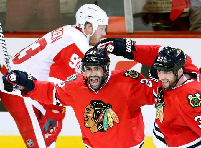 Johnny Oduya a Michal Rozsíval slaví gól