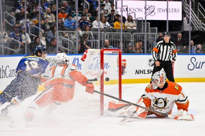 Jan 9, 2025; St. Louis, Missouri, USA;  St. Louis Blues center Robert Thomas (18) taps in his rebound out of the air to score against Anaheim Ducks goaltender Lukas Dosta