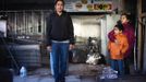 Jaswinder Kaur poses for a photograph with her two children Taranjot, 9, and Harshjot, 5, as they stand in the remains of their convenience and deli store which was destroyed by Hurricane Sandy in New Dorp Beach, Staten Island November 14, 2012. Jaswinder, a single mother, faces an uncertain furture as the building that she rented may need to be torn down. At least 23 New Yorkers were killed in this low lying area of the south shore of Staten Island where mostly one-story former beach bungalows were inundated by flooding. Picture taken November 14, 2012. REUTERS/Mike Segar (UNITED STATES - Tags: DISASTER ENVIRONMENT) ATTENTION EDITORS PICTURE 02 OF 19 FOR PACKAGE 'SURVIVING SANDY' SEARCH 'SEGAR SANDY' FOR ALL PICTURES Published: Lis. 20, 2012, 3:30 odp.