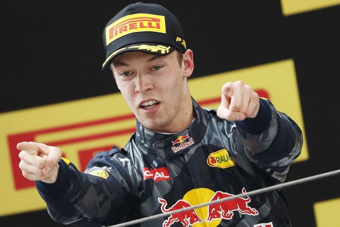 Red Bull Formula One driver Daniil Kvyat of Russia celebrates after the Chinese Grand Prix.