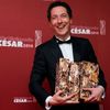 Guillaume Gallienne poses with his awards for &quot;Les Garcons Et Guillaume, A Table!&quot; at the 39th Cesar Awards ceremony in Paris