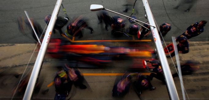 Red Bull F1 driver Daniel Ricciardo makes a pit-stop.