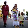 Najara Apraku walks with her family in the Little Ethiopia area of Los Angeles