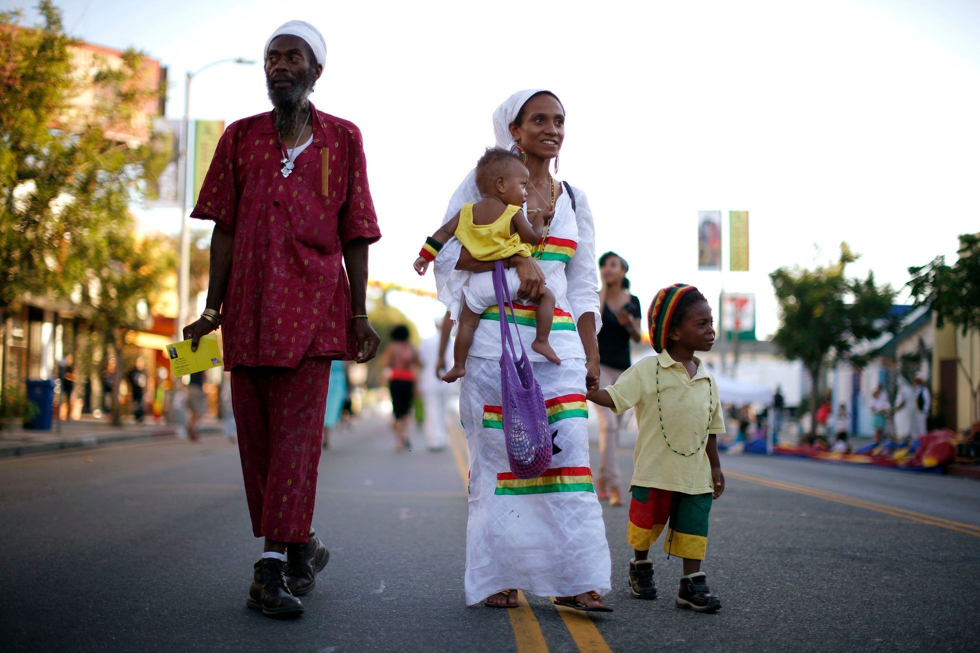 Najara Apraku walks with her family in the Little Ethiopia area of Los Angeles
