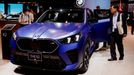 People look at the BMW X2 at the BMW booth during the Japan Mobility Show 2023 at Tokyo Big Sight in Tokyo, Japan October 25, 2023.  REUTERS/Issei Kato